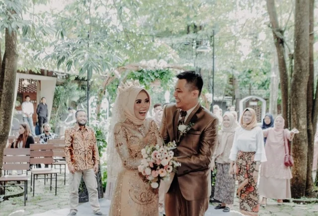 Option A: a wedding couple among guests