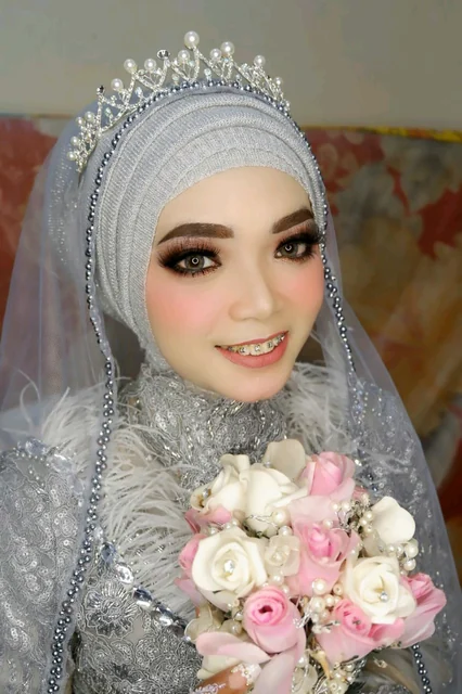 Option D: a bride with a bouquet